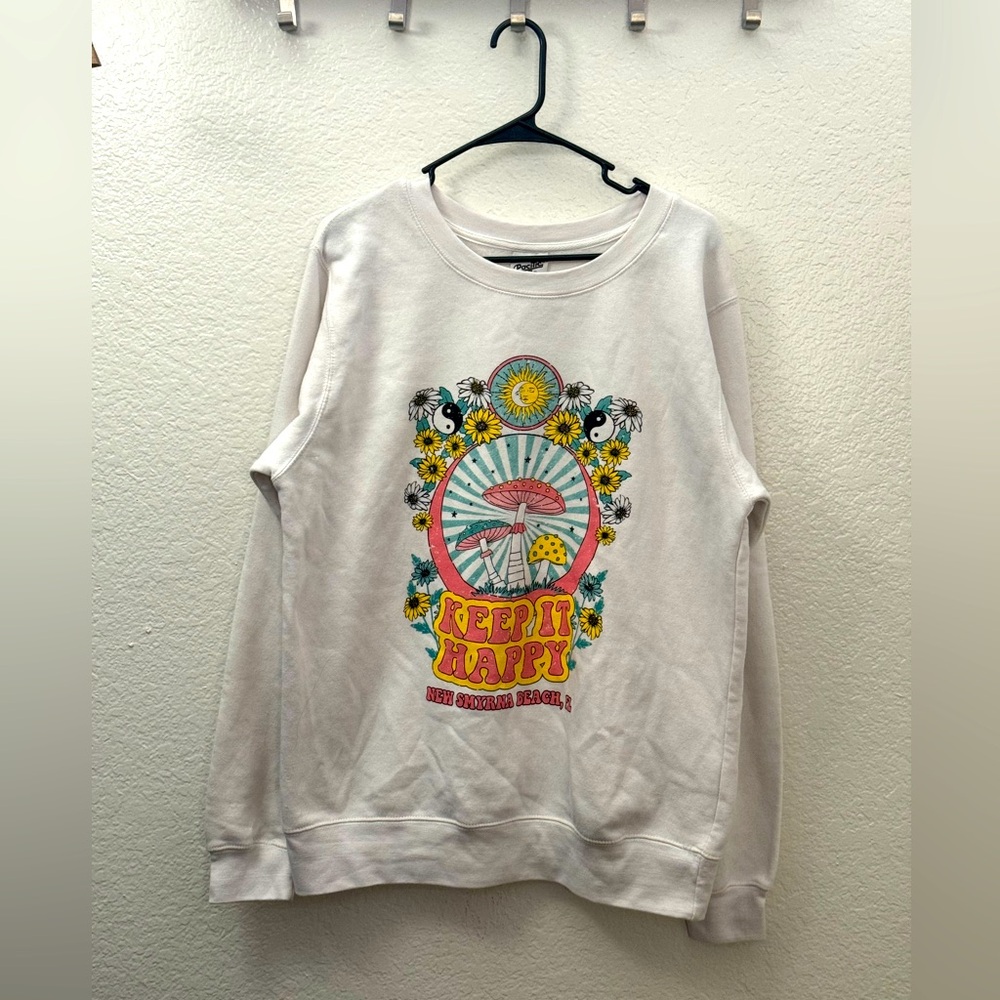 white “Keep it Happy” sweatshirt